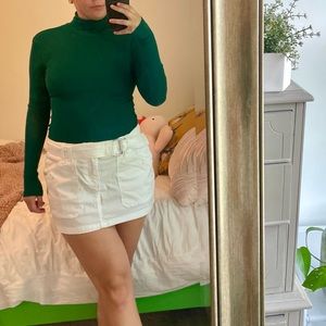 emerald green turtleneck bodysuit